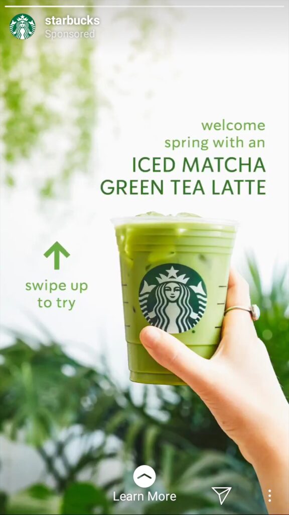 Starbucks Instagram Ad uses the "Swipe Up" Call to Action coupled with a clear repeat of the same instruction.